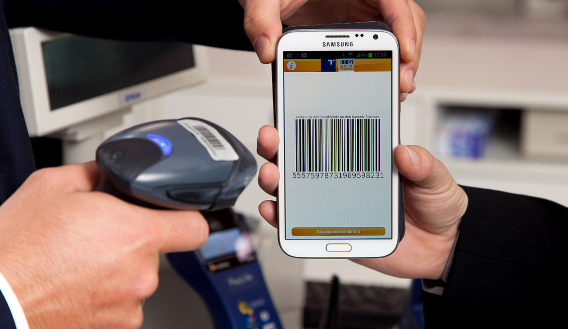 Mobile Payment - Richard Tanzer Fotografie - Wikimedia Abbildung von Smartphone mit Strichcode und Scanner