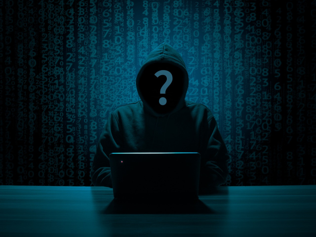 Abbildung einer Silhouette vor einem Laptop